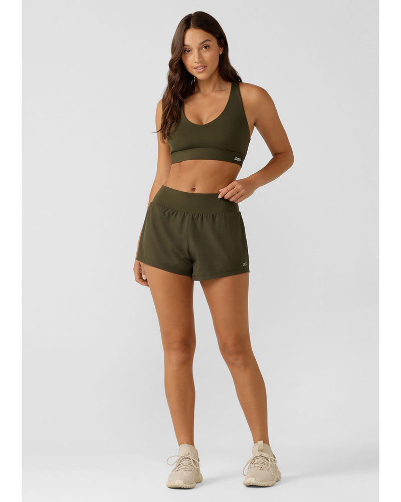 lorna-jane-stretch-and-stride-pocket-run-short-luxury-green-front