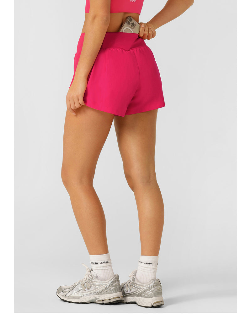 lorna-jane-stretch-and-stride-pocket-run-short-neon-raspberry