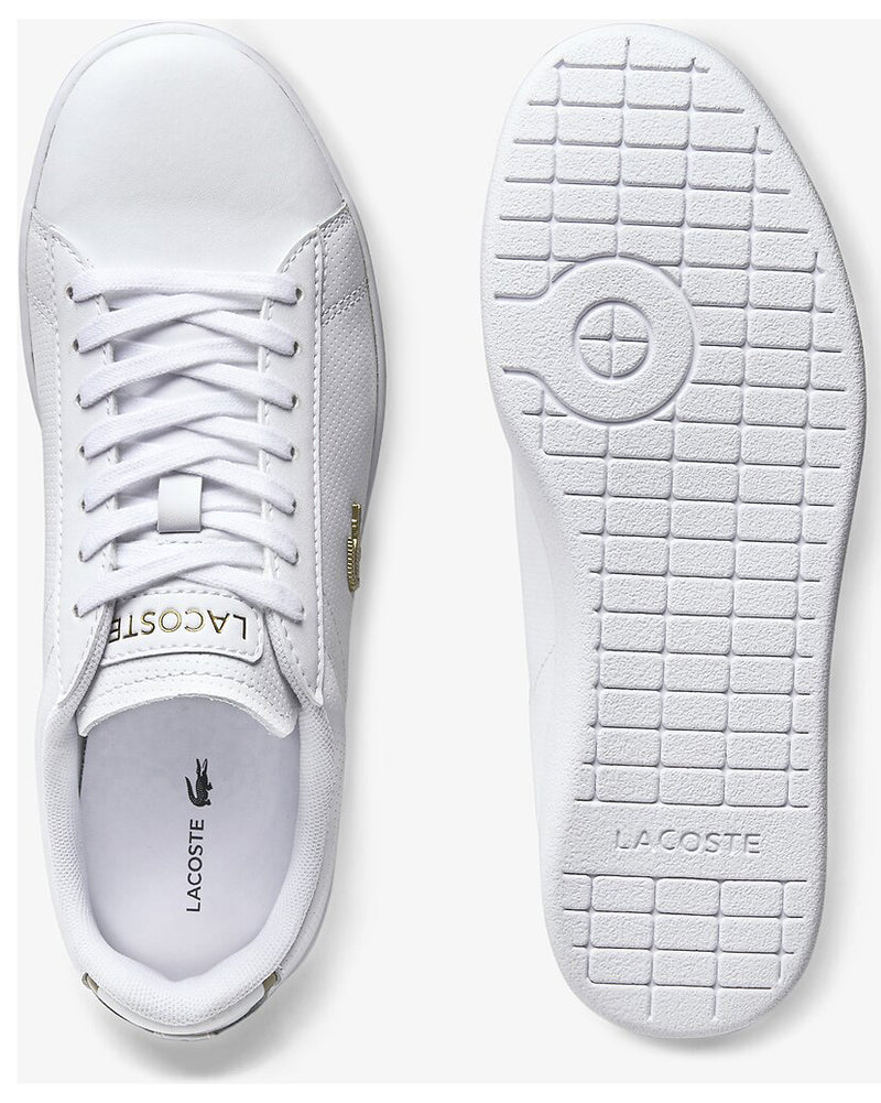 Top and sole view of Lacoste carnaby evo white leather sneaker with gold alligator