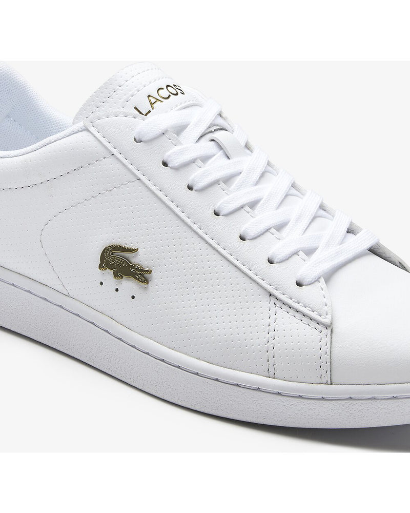 Side view of Lacoste carnaby evo white leather sneaker with gold alligator