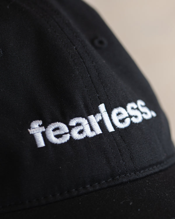 Close up of logo of  Fearless davie cap in black
