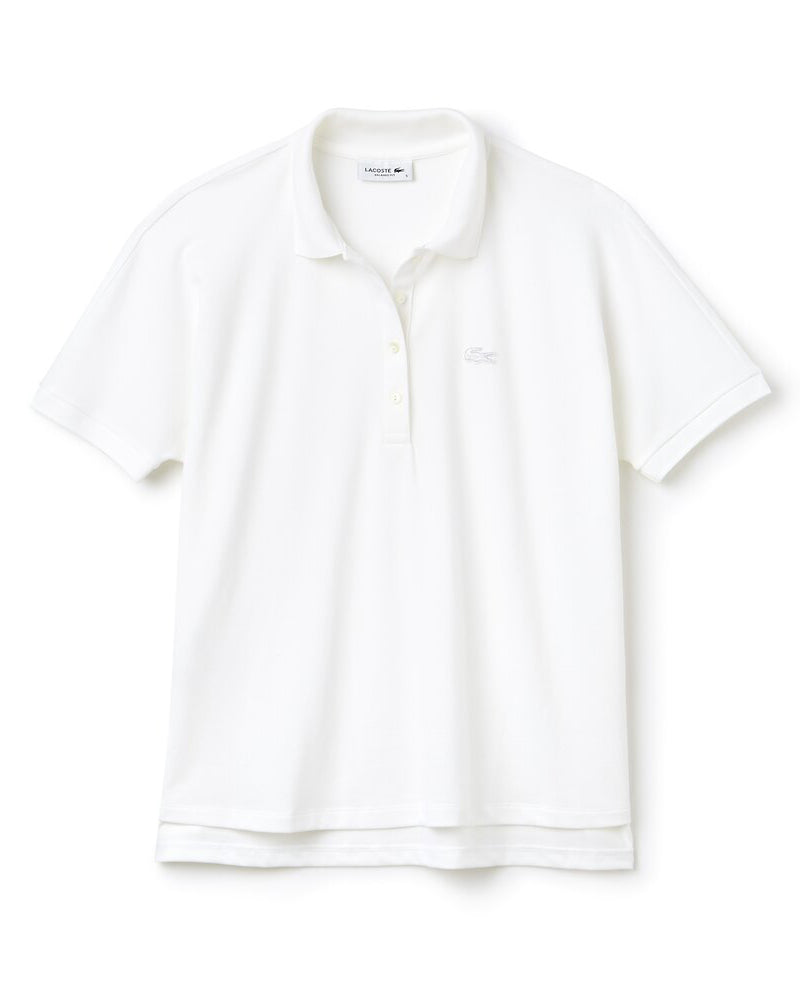 Front view of lacoste relaxed fit polo in white