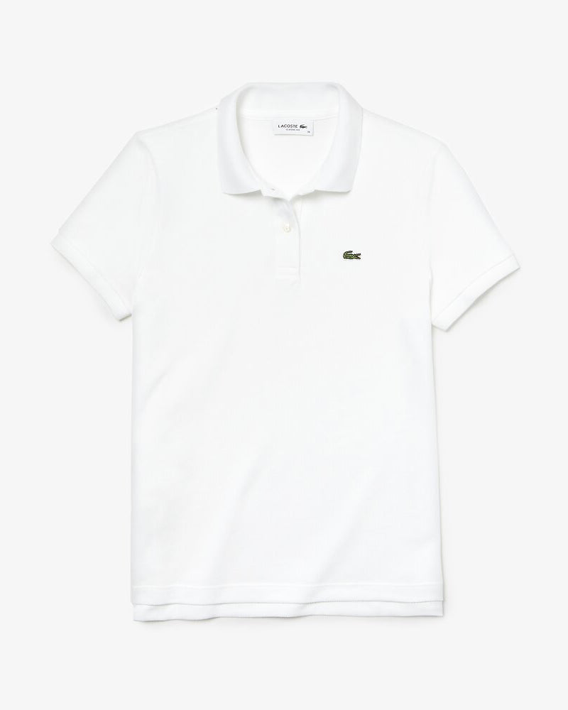Front view of Lacoste classic 2 button relaxed fit polo in white with green alligator on chest