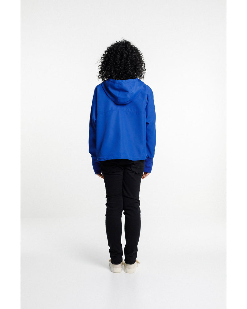 rose-road-shell-jacket-cyber-blue-back-view