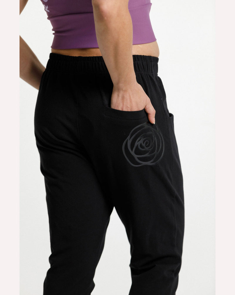 rose-road-stadium-pant-black-with-gloss-rose-back-view