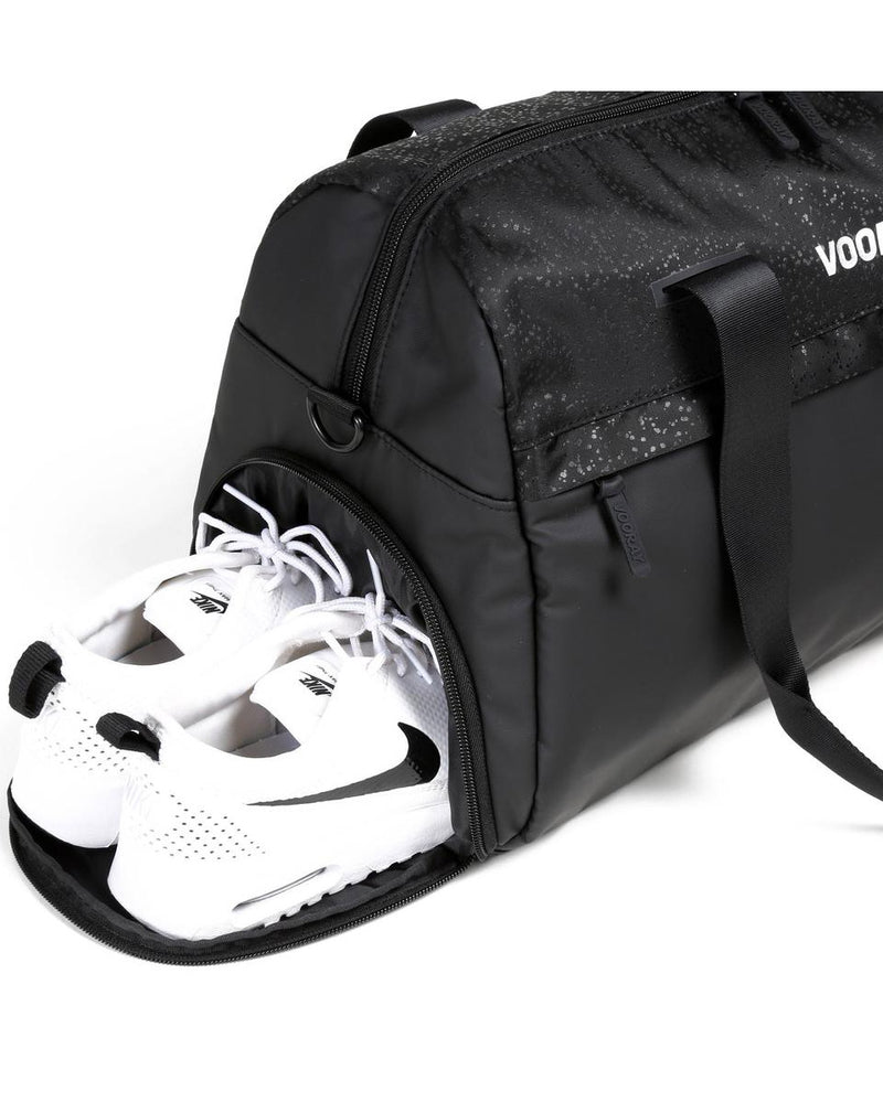 Close up of shoe compartment on Black Foil trainer duffel bag