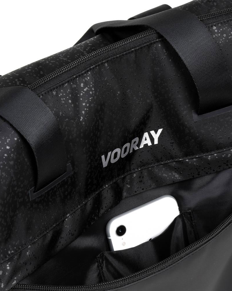 Front zip opened on black foil trainer duffel bag showing phone pocket