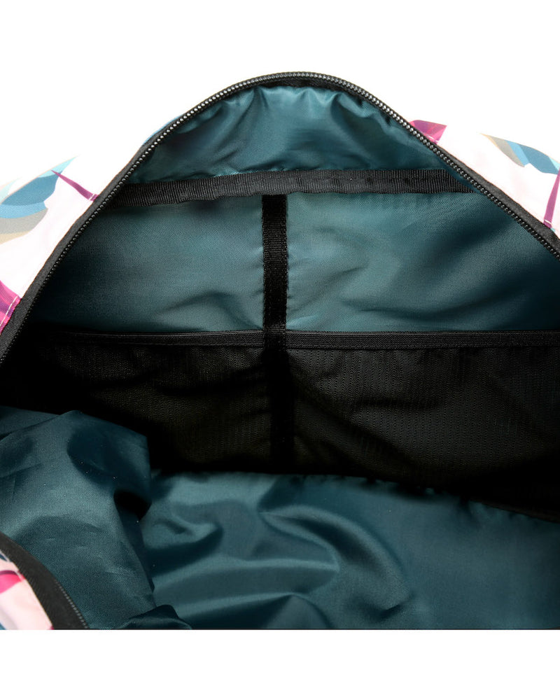 Inside lining and pockets of botanic pink burner gym duffel bag